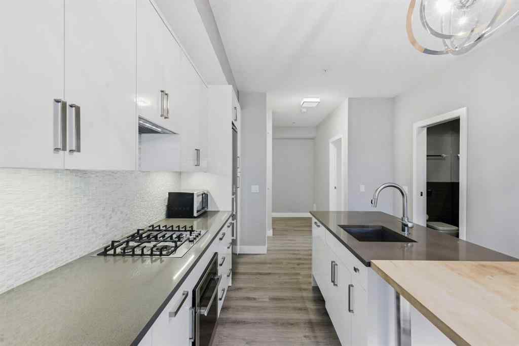 MLS® A2261901 - Unit #209 1521 26 Avenue SW in South Calgary Calgary, Residential