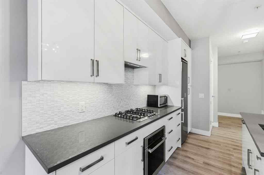 MLS® A2261901 - Unit #209 1521 26 Avenue SW in South Calgary Calgary, Residential