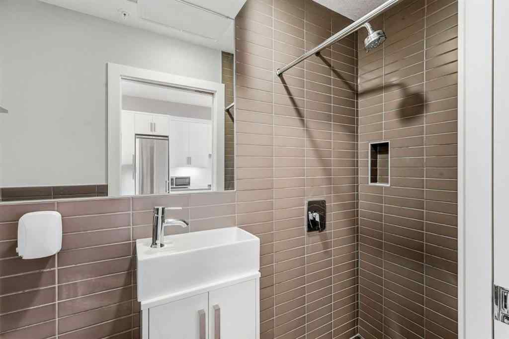 MLS® A2261901 - Unit #209 1521 26 Avenue SW in South Calgary Calgary, Residential