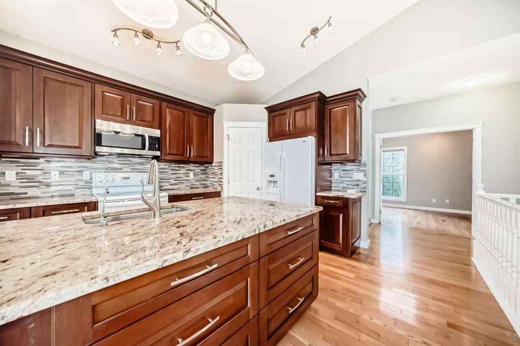 MLS® A2261974 - 191 West Springs Close SW in West Springs Calgary, Residential