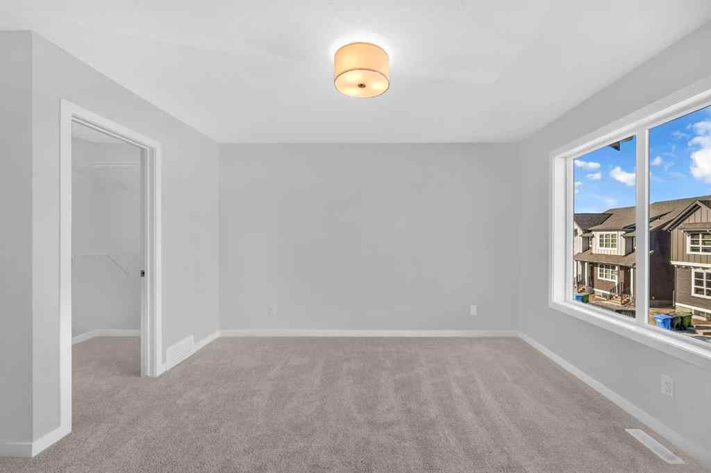 MLS® A2262015 - 61 Savanna Place NE in Saddle Ridge Calgary, Residential