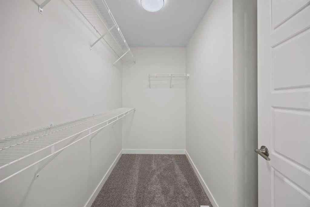 MLS® A2262029 - 108 Waterford Way  in Waterford Chestermere, Residential