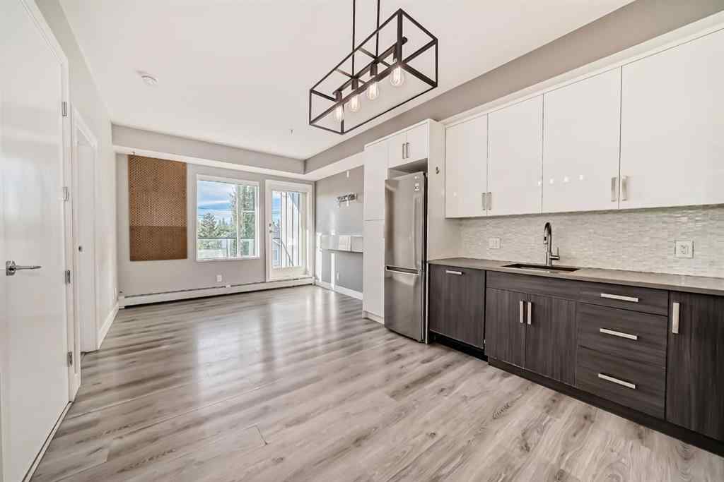 MLS® A2262057 - Unit #206 1521 26 Avenue SW in South Calgary Calgary, Residential