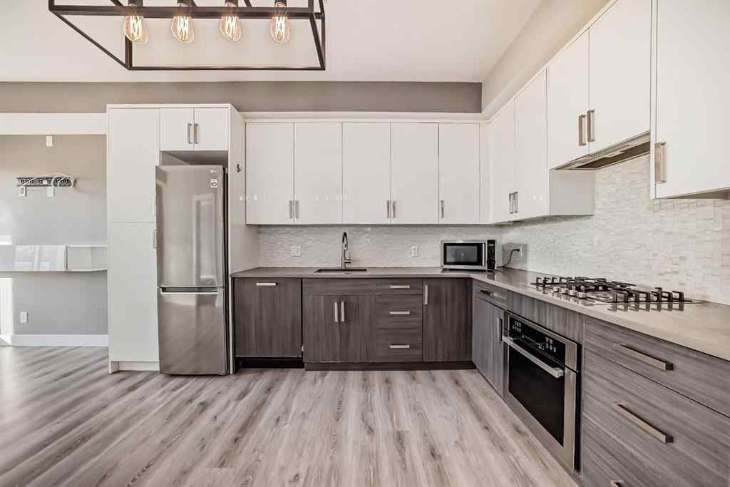 MLS® A2262057 - Unit #206 1521 26 Avenue SW in South Calgary Calgary, Residential