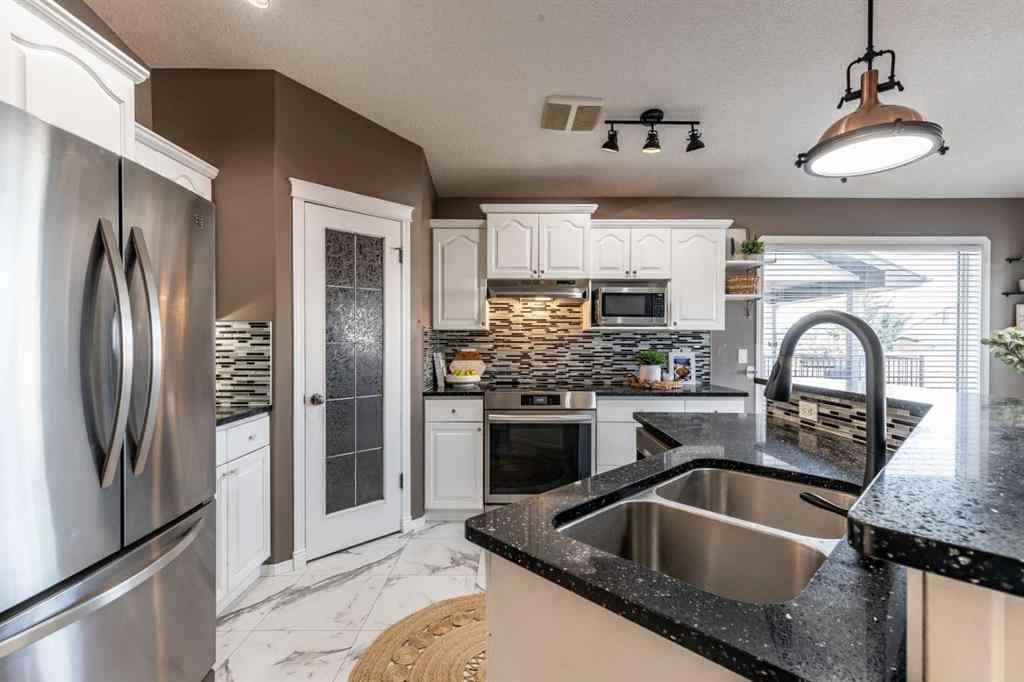 MLS® A2262065 - 310 Jesmond Drive SW in NONE Redcliff, Residential