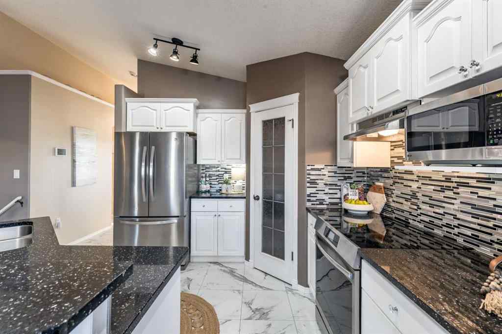 MLS® A2262065 - 310 Jesmond Drive SW in NONE Redcliff, Residential