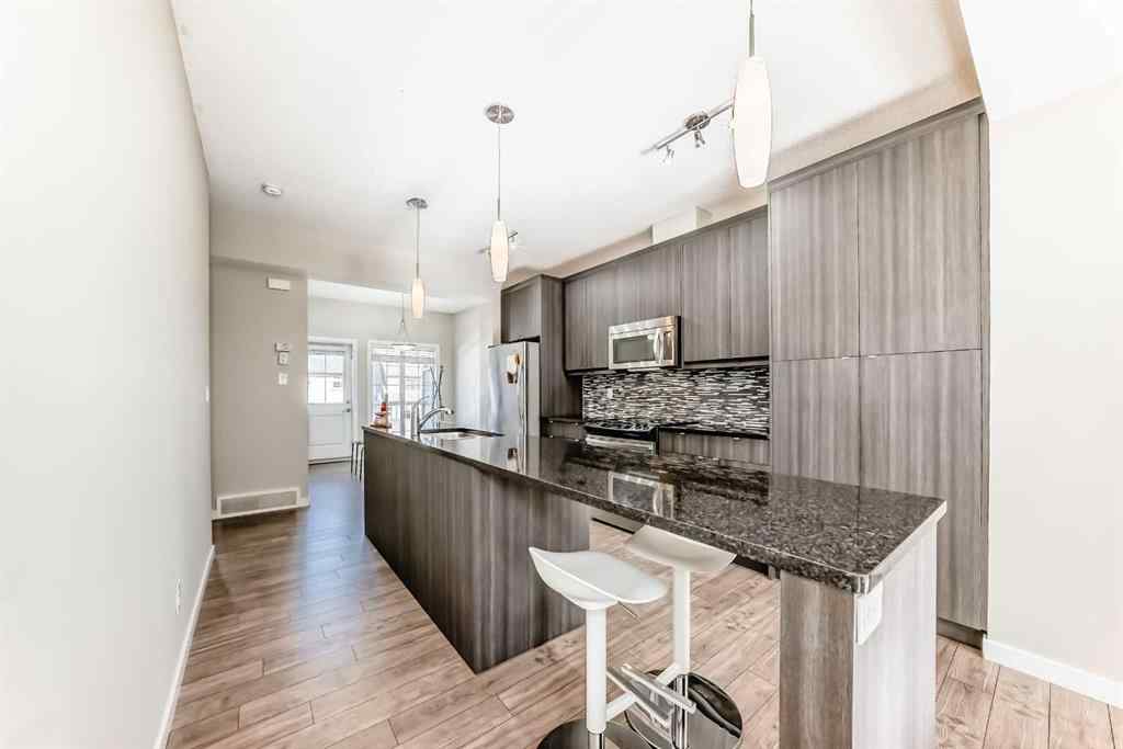 MLS® A2262078 - 128 Marquis Lane SE in Mahogany Calgary, Residential