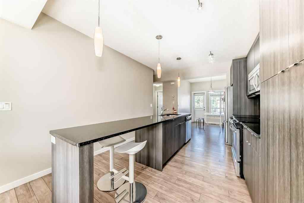 MLS® A2262078 - 128 Marquis Lane SE in Mahogany Calgary, Residential