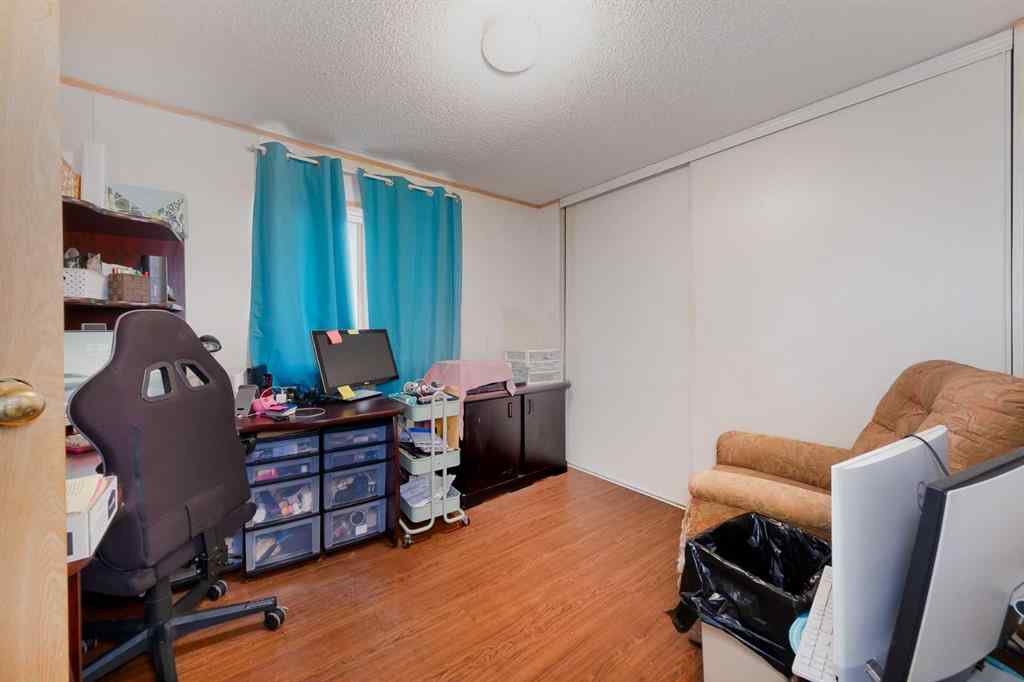 MLS® A2262082 - 245 Ranchwood Lane  in Ranch Estates Strathmore, Mobile