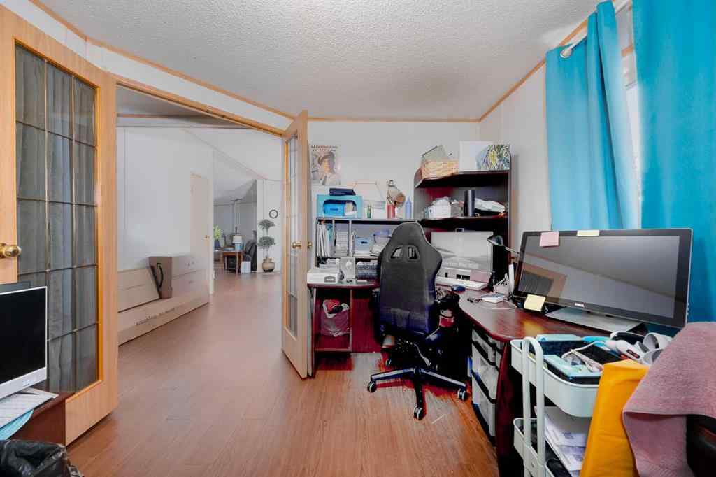 MLS® A2262082 - 245 Ranchwood Lane  in Ranch Estates Strathmore, Mobile