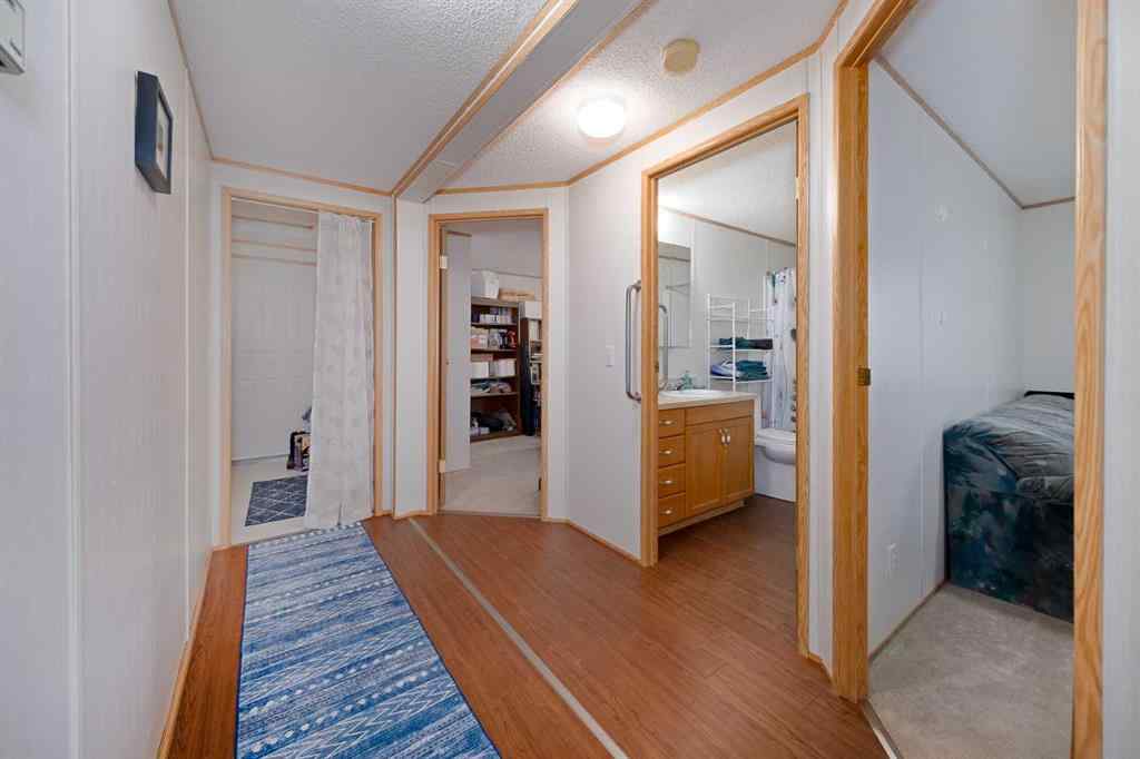 MLS® A2262082 - 245 Ranchwood Lane  in Ranch Estates Strathmore, Mobile