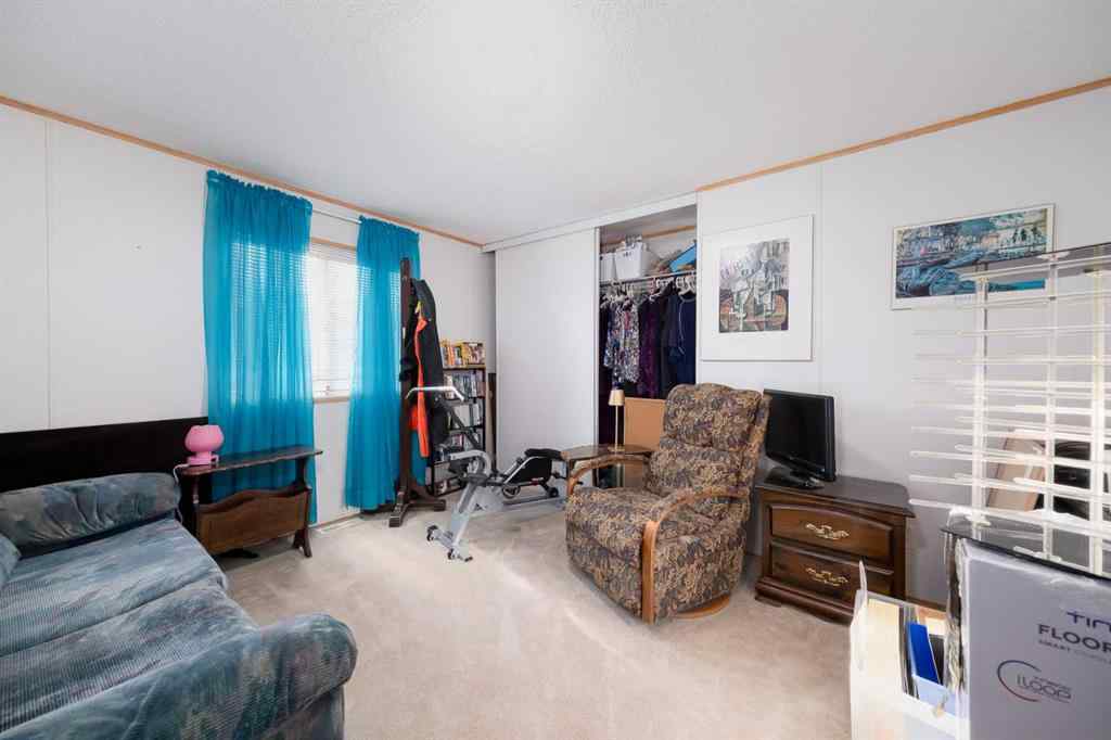 MLS® A2262082 - 245 Ranchwood Lane  in Ranch Estates Strathmore, Mobile