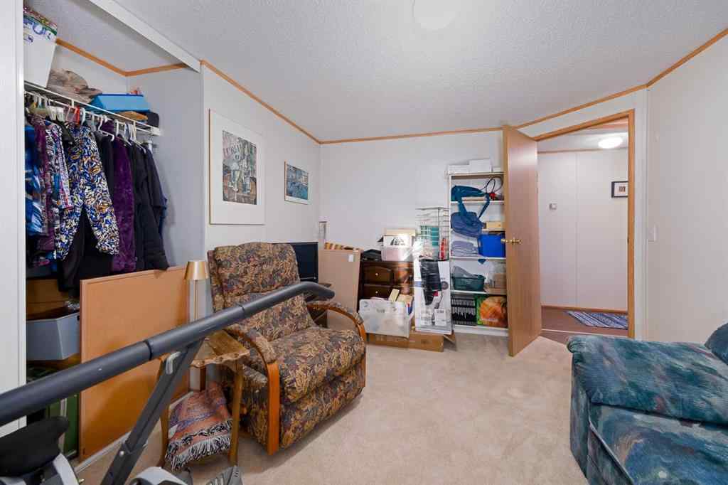 MLS® A2262082 - 245 Ranchwood Lane  in Ranch Estates Strathmore, Mobile