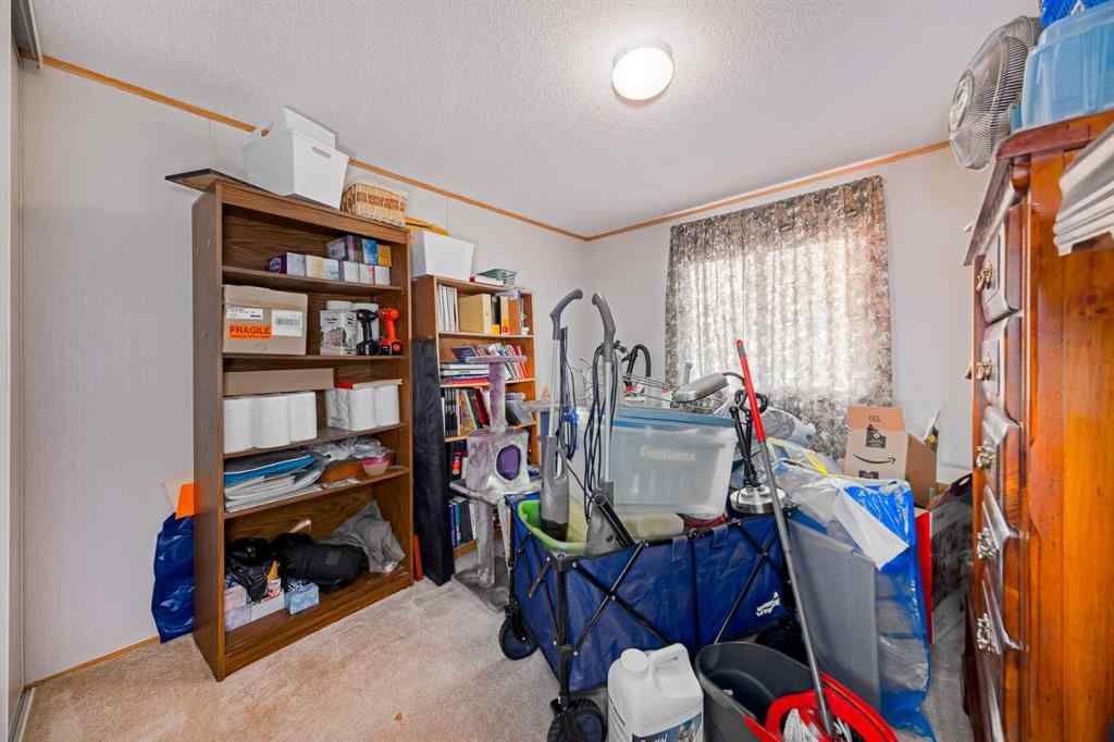 MLS® A2262082 - 245 Ranchwood Lane  in Ranch Estates Strathmore, Mobile