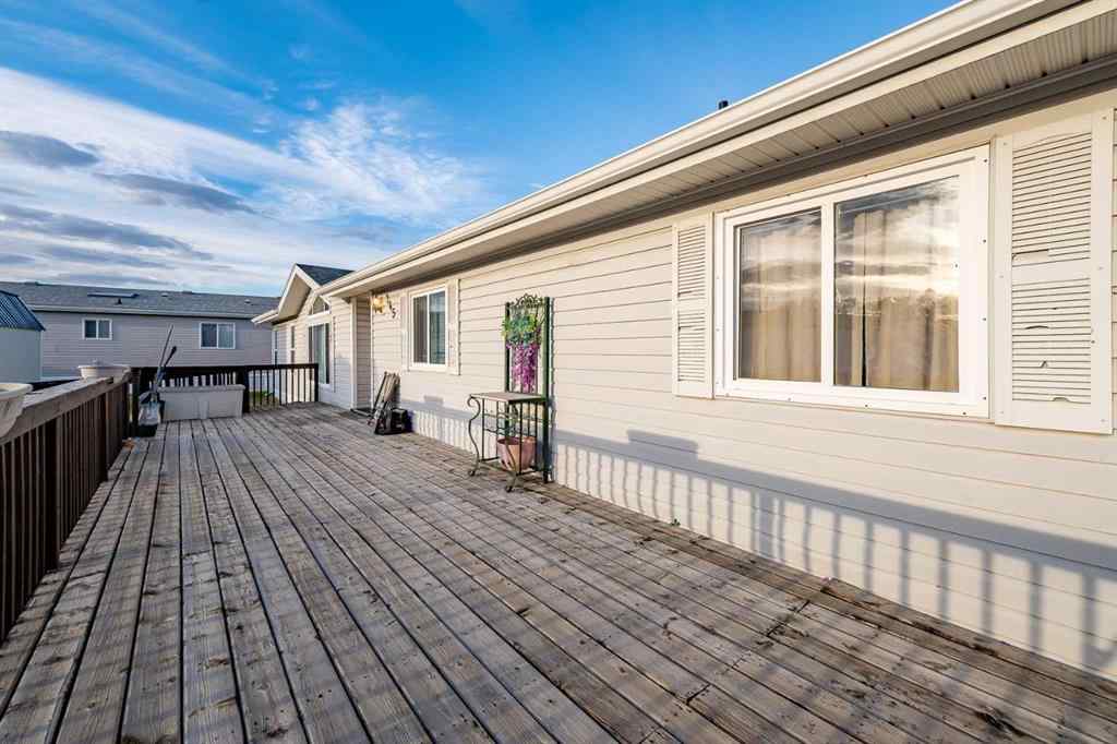 MLS® A2262082 - 245 Ranchwood Lane  in Ranch Estates Strathmore, Mobile