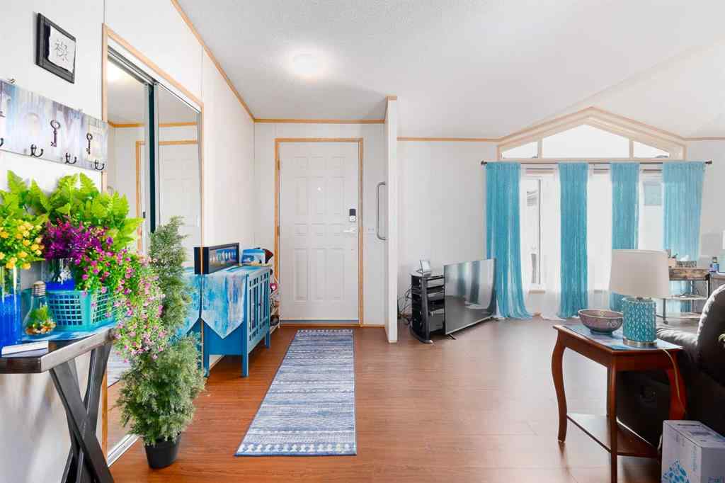 MLS® A2262082 - 245 Ranchwood Lane  in Ranch Estates Strathmore, Mobile