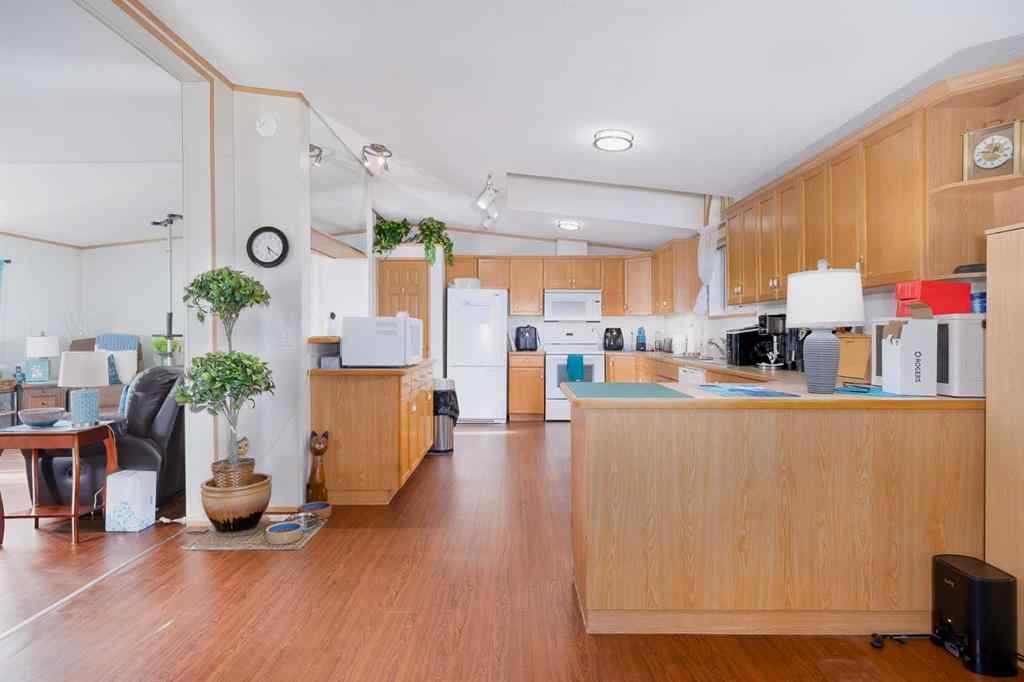 MLS® A2262082 - 245 Ranchwood Lane  in Ranch Estates Strathmore, Mobile