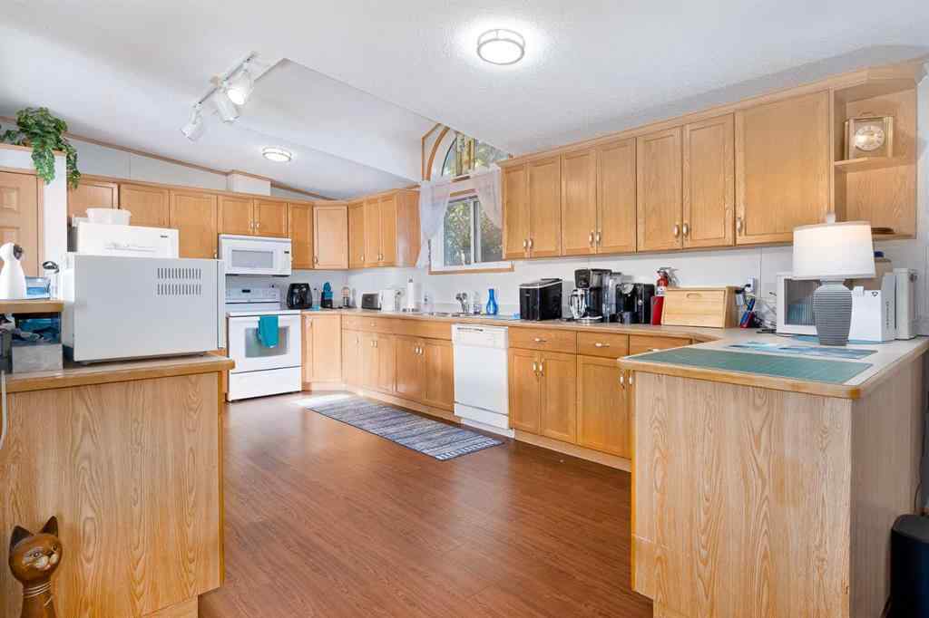 MLS® A2262082 - 245 Ranchwood Lane  in Ranch Estates Strathmore, Mobile