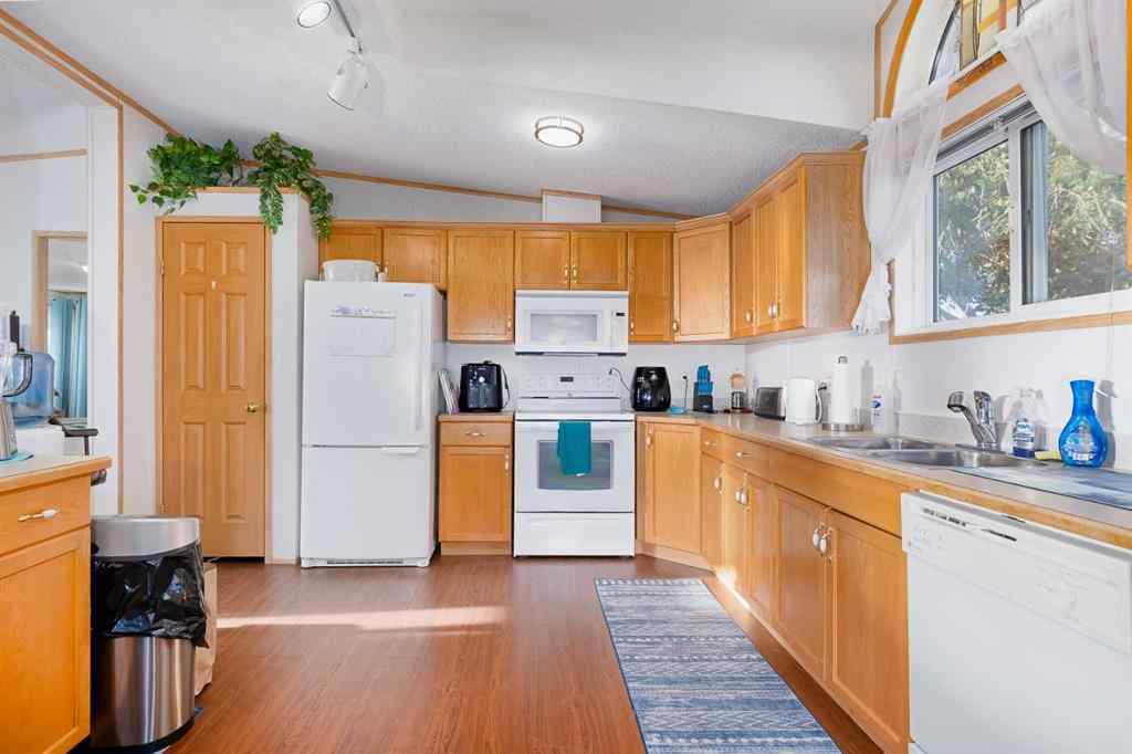 MLS® A2262082 - 245 Ranchwood Lane  in Ranch Estates Strathmore, Mobile