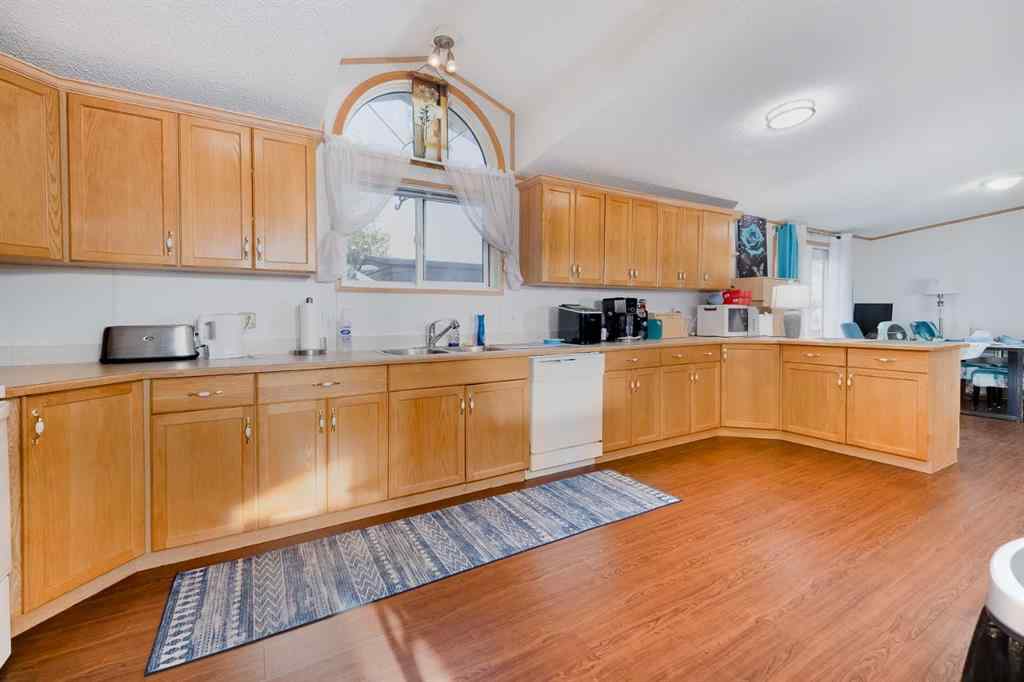 MLS® A2262082 - 245 Ranchwood Lane  in Ranch Estates Strathmore, Mobile