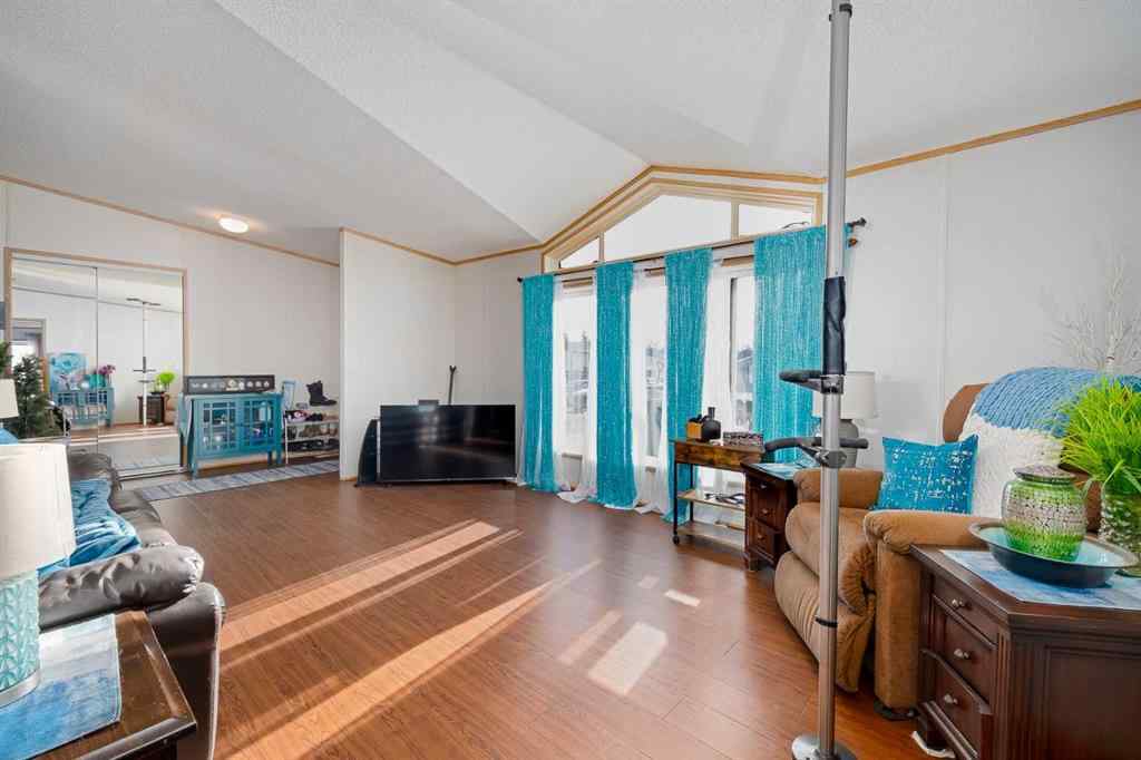 MLS® A2262082 - 245 Ranchwood Lane  in Ranch Estates Strathmore, Mobile