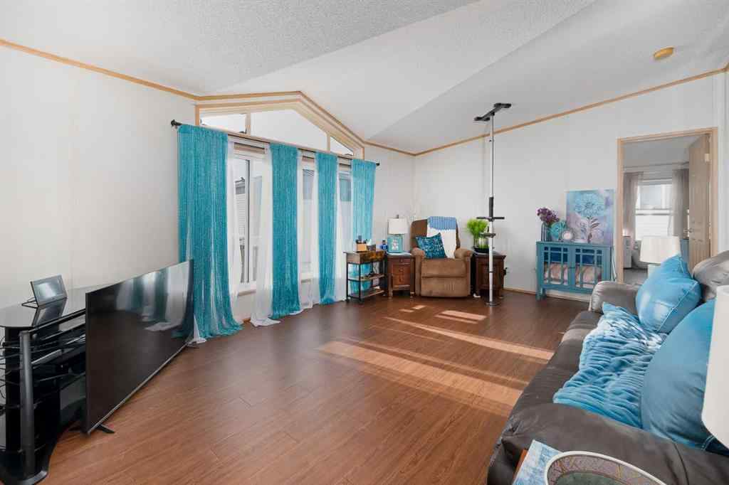 MLS® A2262082 - 245 Ranchwood Lane  in Ranch Estates Strathmore, Mobile