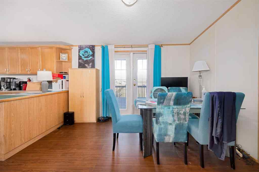 MLS® A2262082 - 245 Ranchwood Lane  in Ranch Estates Strathmore, Mobile