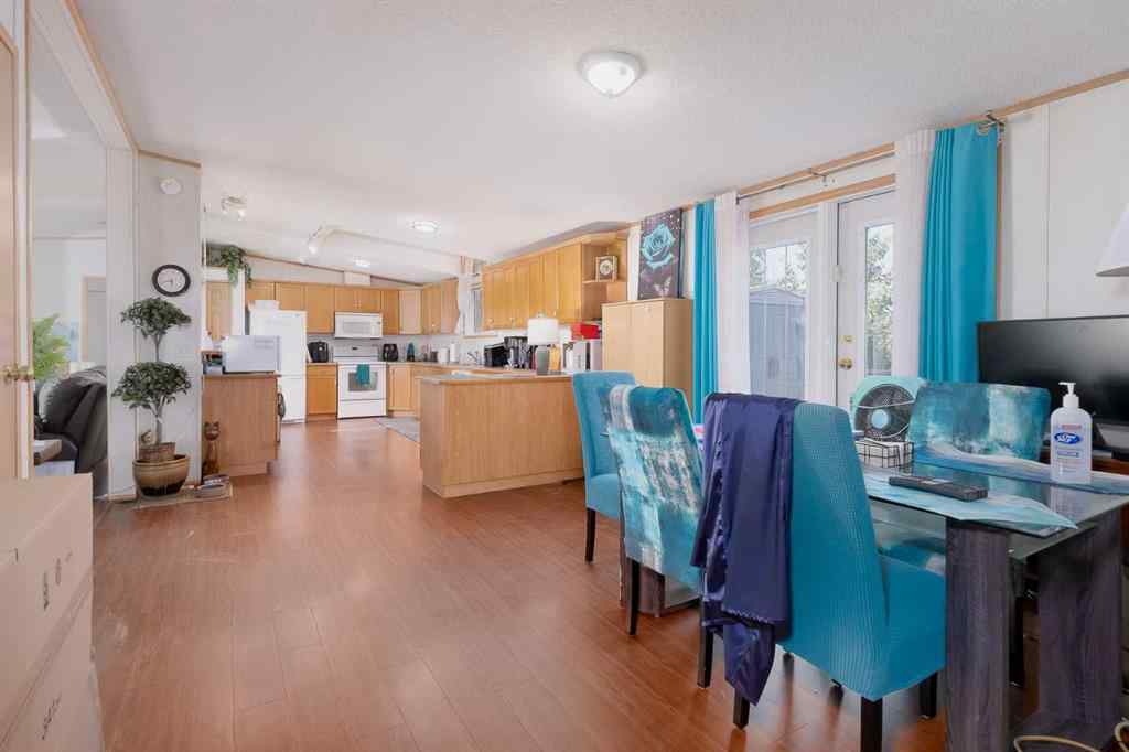 MLS® A2262082 - 245 Ranchwood Lane  in Ranch Estates Strathmore, Mobile