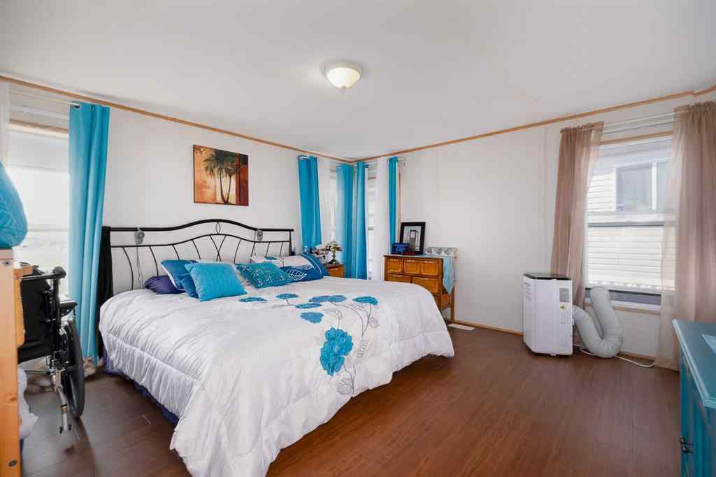 MLS® A2262082 - 245 Ranchwood Lane  in Ranch Estates Strathmore, Mobile