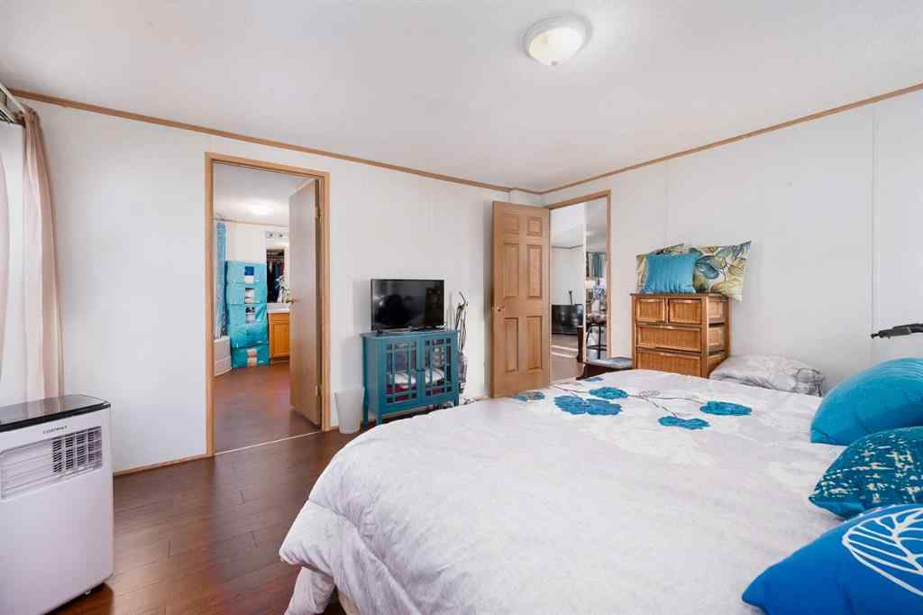 MLS® A2262082 - 245 Ranchwood Lane  in Ranch Estates Strathmore, Mobile