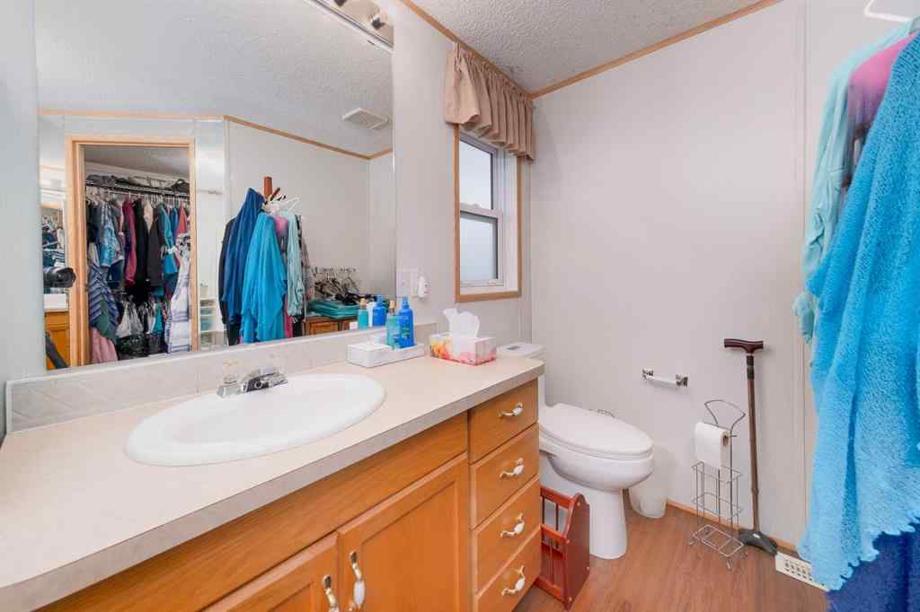 MLS® A2262082 - 245 Ranchwood Lane  in Ranch Estates Strathmore, Mobile