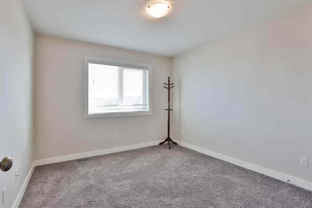 MLS® A2262096 - 21 Riverford Close W in Riverstone Lethbridge, Residential