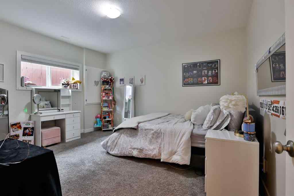 MLS® A2262096 - 21 Riverford Close W in Riverstone Lethbridge, Residential