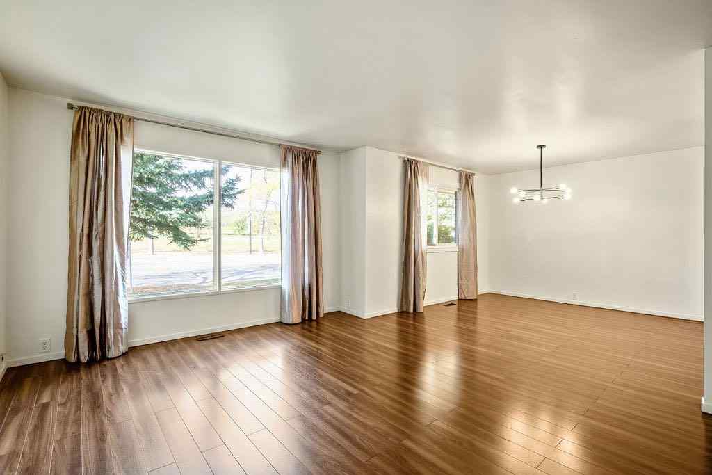 MLS® A2262108 - 588 Strathcona Drive SW in Strathcona Park Calgary, Residential
