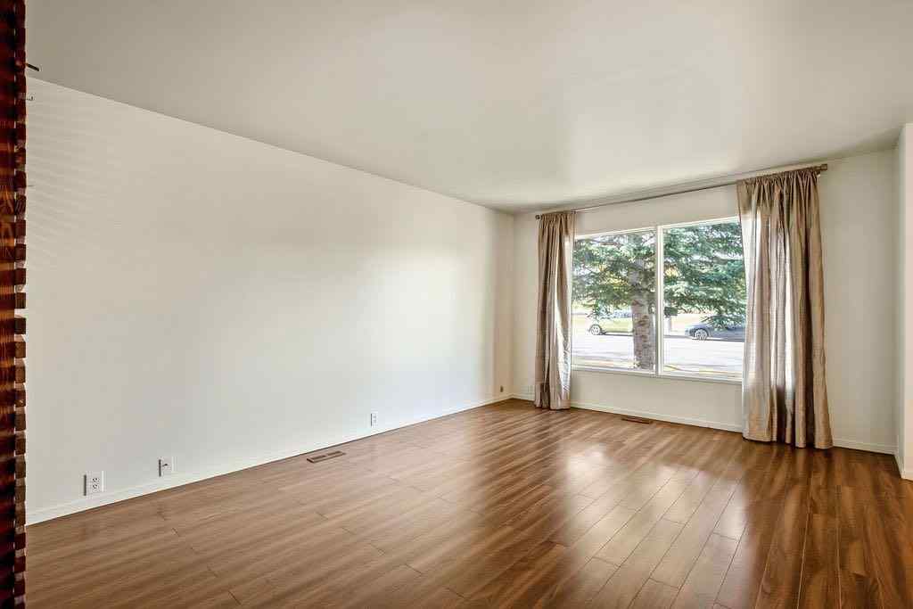 MLS® A2262108 - 588 Strathcona Drive SW in Strathcona Park Calgary, Residential