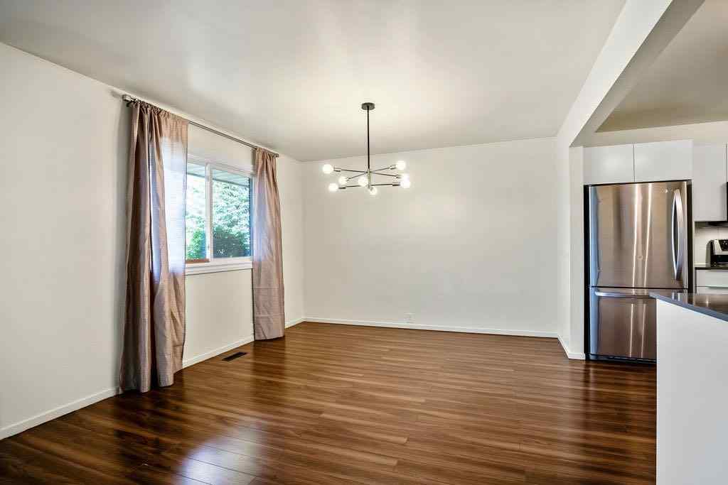 MLS® A2262108 - 588 Strathcona Drive SW in Strathcona Park Calgary, Residential