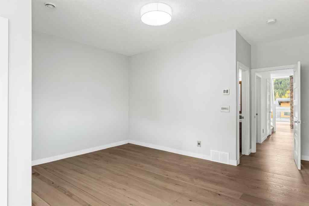 MLS® A2262139 - Unit #204 105 Stewart Creek Rise SW in Three Sisters Canmore, Residential