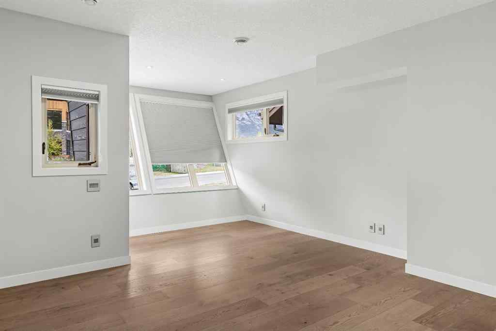 MLS® A2262139 - Unit #204 105 Stewart Creek Rise SW in Three Sisters Canmore, Residential