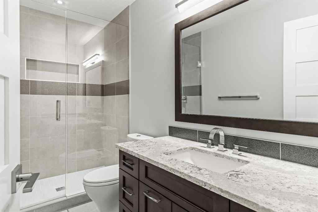 MLS® A2262139 - Unit #204 105 Stewart Creek Rise SW in Three Sisters Canmore, Residential