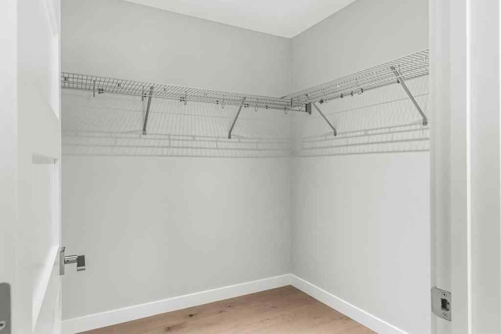 MLS® A2262139 - Unit #204 105 Stewart Creek Rise SW in Three Sisters Canmore, Residential