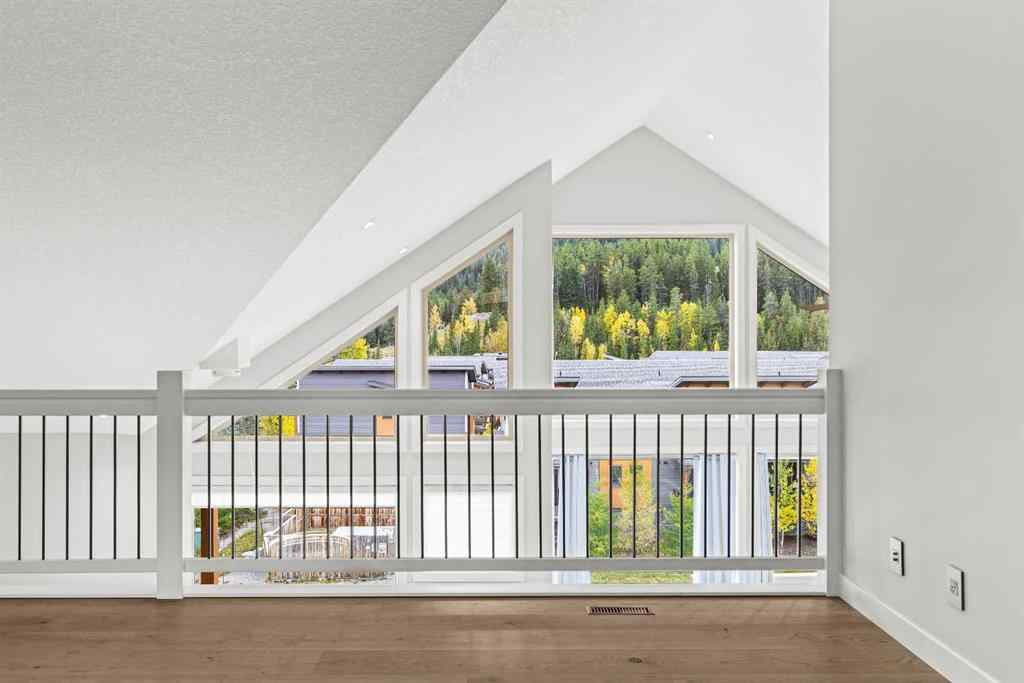 MLS® A2262139 - Unit #204 105 Stewart Creek Rise SW in Three Sisters Canmore, Residential