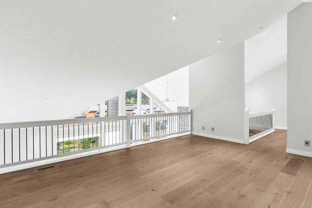 MLS® A2262139 - Unit #204 105 Stewart Creek Rise SW in Three Sisters Canmore, Residential