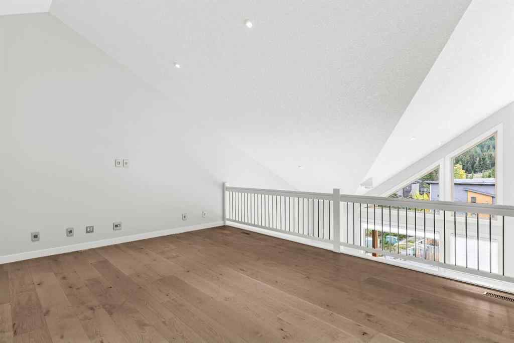 MLS® A2262139 - Unit #204 105 Stewart Creek Rise SW in Three Sisters Canmore, Residential