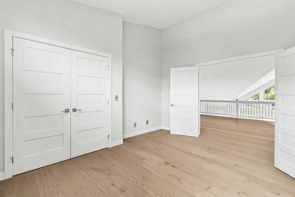 MLS® A2262139 - Unit #204 105 Stewart Creek Rise SW in Three Sisters Canmore, Residential