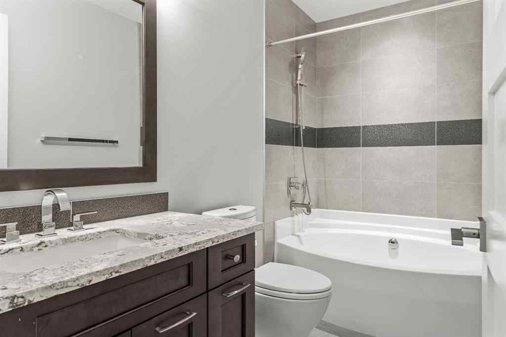 MLS® A2262139 - Unit #204 105 Stewart Creek Rise SW in Three Sisters Canmore, Residential