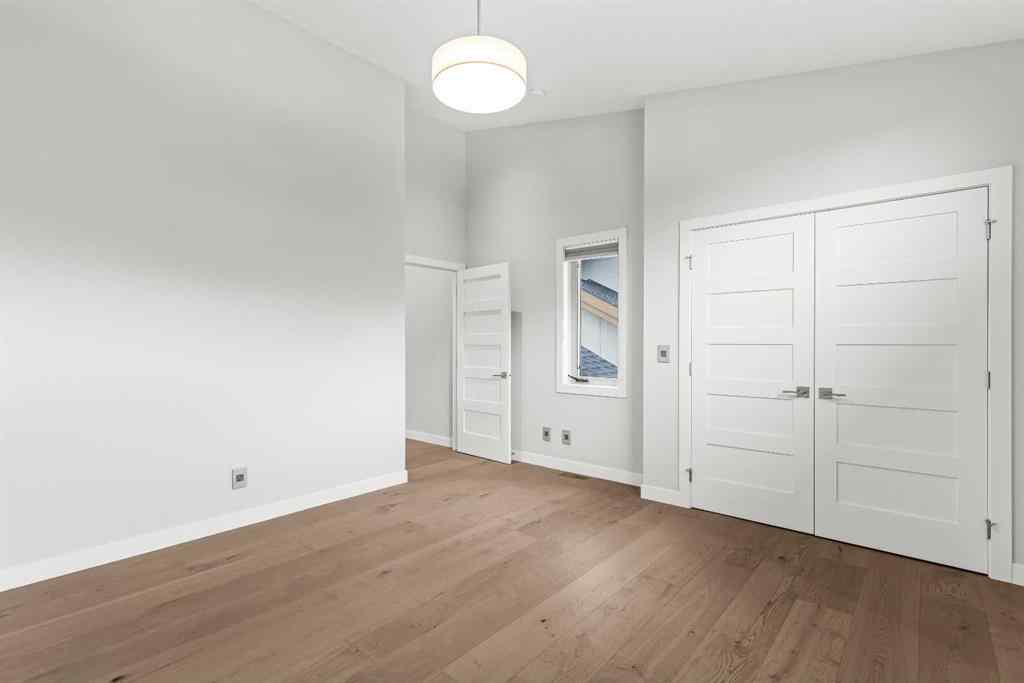 MLS® A2262139 - Unit #204 105 Stewart Creek Rise SW in Three Sisters Canmore, Residential