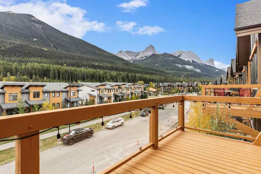MLS® A2262139 - Unit #204 105 Stewart Creek Rise SW in Three Sisters Canmore, Residential