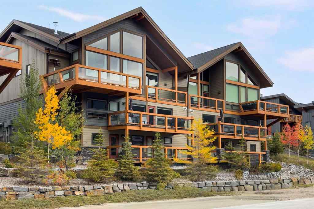 MLS® A2262139 - Unit #204 105 Stewart Creek Rise SW in Three Sisters Canmore, Residential
