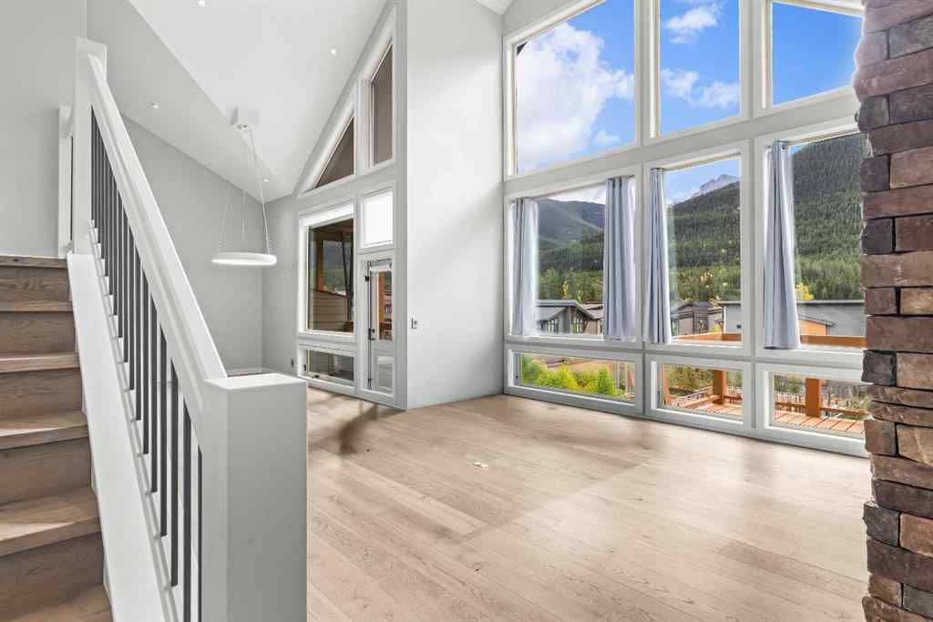 MLS® A2262139 - Unit #204 105 Stewart Creek Rise SW in Three Sisters Canmore, Residential