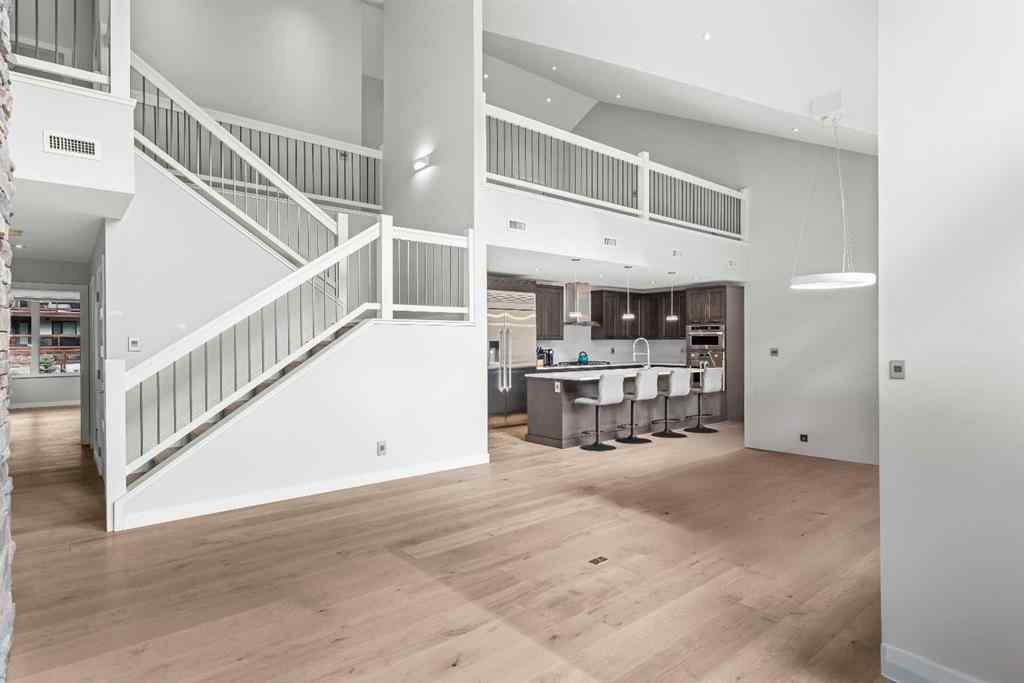 MLS® A2262139 - Unit #204 105 Stewart Creek Rise SW in Three Sisters Canmore, Residential